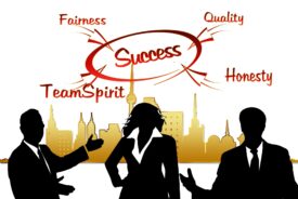 three people silhouetted in suits under the words fairness success team spirit, quality and honesty